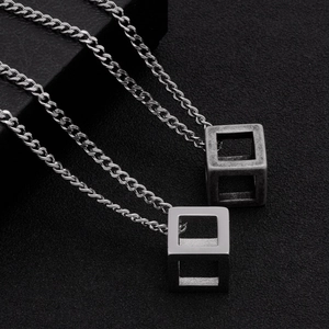 Hollow cube pendant necklace set in polished silver and vintage black titanium steel