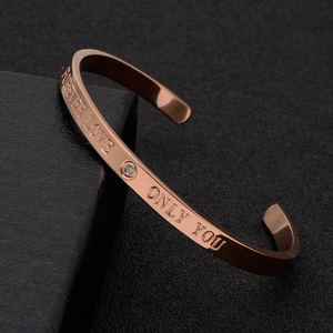 Rose gold stainless steel C-shaped open bangle with Forever Love engraving and zircon stone