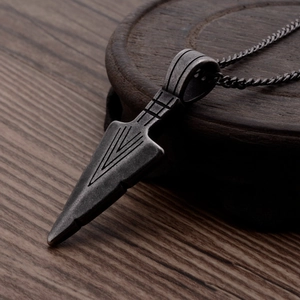 Vintage titanium steel arrowhead pendant necklace with retro engraved details and black chain