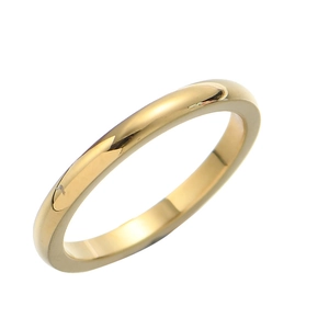 Close-up of minimalist 2mm thin gold stainless steel ring with polished mirror finish
