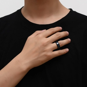 Men's black stainless steel ring with blue carbon fiber inlay and polished finish