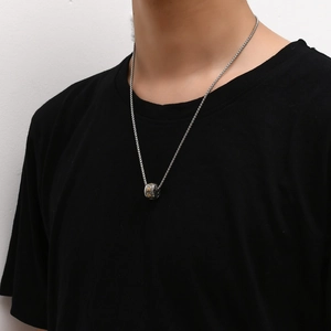 Men's retro stainless steel cylinder pendant necklace with gold box chain detail