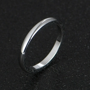 Macro shot of 2mm ultra-slim polished stainless steel ring with mirror finish texture