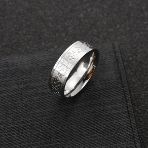 Men's vintage titanium steel dragon ring with engraved relief pattern on black background