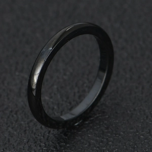 Minimalist 2mm black polished stainless steel ring with a sleek mirror finish surface