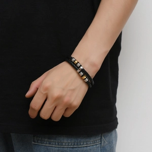 Men's double-layered braided leather bracelet with gold and silver magnetic clasp