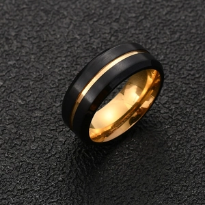 Two-tone matte black and gold stainless steel men's ring with a brushed finish