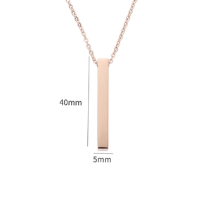 Macro shot of rose gold rectangular bar pendant with 40x5mm dimension markings