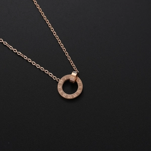 Rose gold Roman numeral double ring necklace with a sparkling diamond accent