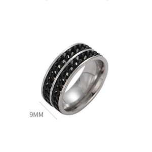 Detail shot of a 9mm wide punk style ring with double black chain inlay on silver steel