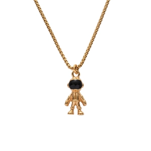 Detailed view of astronaut pendant with black enamel visor and golden box chain texture