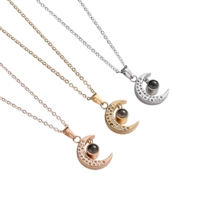 Minimalist moon and star necklace with projection stone in silver gold and rose gold