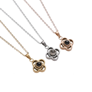 I Love You projection four-leaf clover necklaces in gold, silver, and rose gold finishes