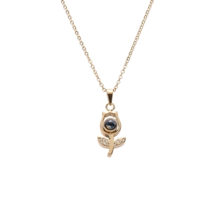 Golden tulip pendant necklace with projection stone and zircon accents on a white background