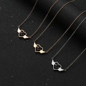 Angel wing heart necklace with 100 languages projection stone in gold, rose gold and silver