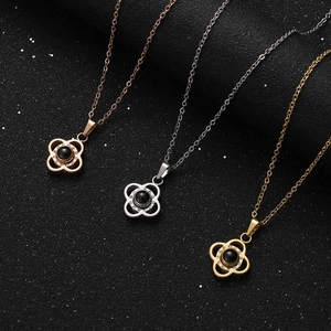 Elegant clover necklace with rhinestones in rose gold, silver, and gold finishes