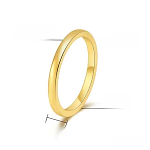 Detail view of a 2mm polished gold plated tungsten steel ring with dimension markers