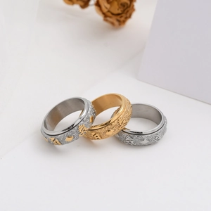 Three-piece set of spinning mantra rings in gold and silver stainless steel finishes