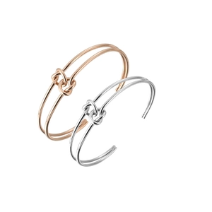 Minimalist double knot open bangles in polished rose gold and silver stainless steel