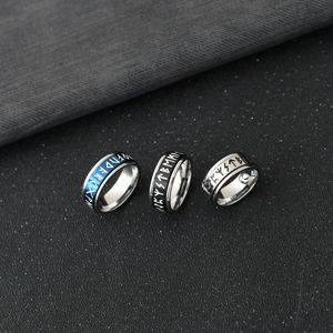 Three-piece Viking rune spinning ring set in silver, blue, and black titanium steel