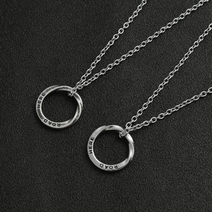 Silver Mobius ring necklace with HERE ROAD engraving in minimalist stainless steel style