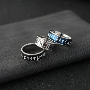 Norse Viking rune rotating rings set in black, blue, and silver stainless steel