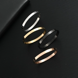 Polished stainless steel buckle bracelets in silver, gold, black, and rose gold finishes