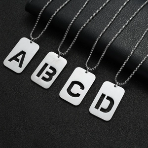 Sleek stainless steel military tag necklace with hollow letter pendants A B C D