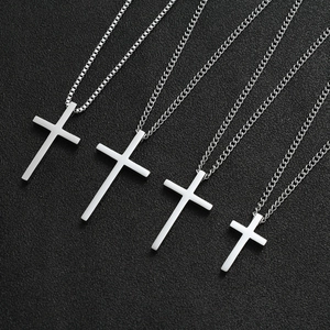 Polished stainless steel cross pendant necklace set in various sizes with silver finish