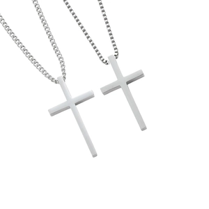 Polished stainless steel cross necklace detail with curb chain and box chain varieties