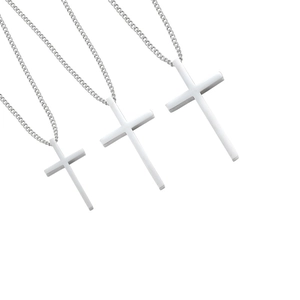Three sizes of polished stainless steel cross necklaces on minimalist link chains