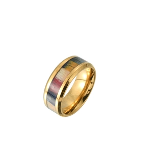 Detail of gold stainless steel ring featuring a multicolor abstract wood grain inlay