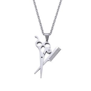 Detailed close-up of a scissor and comb pendant necklace for hairstylists in silver steel