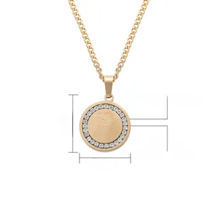 Detail view of 25mm gold caduceus pendant with cubic zirconia and cuban chain