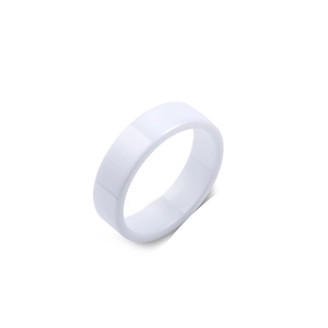 Minimalist white ceramic ring with a polished glossy finish and simple flat band design