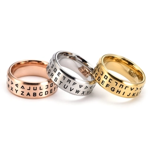 Men's spinning stainless steel rings set in gold, silver and rose gold with alphabet engraving
