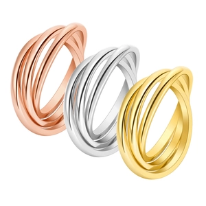 Detailed view of interconnected tricolor rings in rose gold, silver, and gold steel