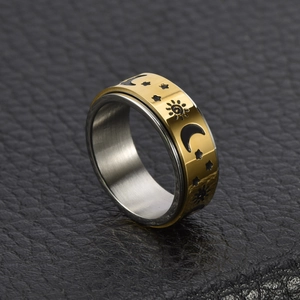 Bague rotative en acier inoxydable avec motif étoile et lune dorée et argent