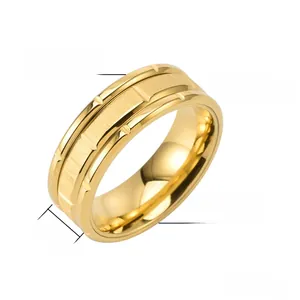 Detail of 8mm golden titanium steel ring showing brushed texture and polished edges