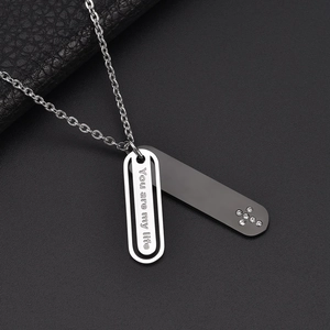 Collana a doppio strato in acciaio inossidabile con pendente a croce e cristallo nero