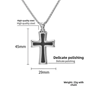 Detailed view of black enamel cross pendant with dimensions 45mm x 29mm in stainless steel