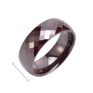 Detailed view of 8mm wide faceted black ceramic ring with polished finish and dimensions