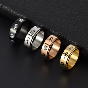 Rotating stainless steel rings with Horus eye and Ankh patterns in four metallic colors