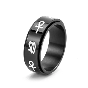 Black stainless steel spinner ring with Eye of Horus and Ankh symbols on white background