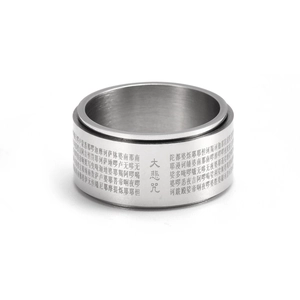 Rotating stainless steel mantra ring featuring engraved Buddhist scripture on wide band