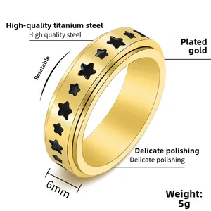 6mm gold spinner ring with black star patterns, stainless steel detail view, weight 5g