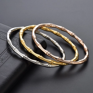 Bamboo-style stainless steel bangles in silver, gold, and rose gold finish for women