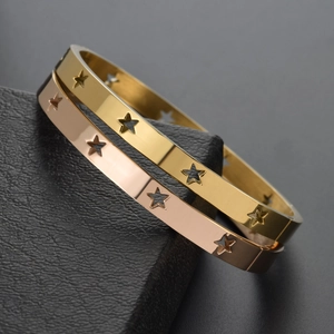 Fashion hollow star cuff bracelet in gold and rose gold finish for men and women