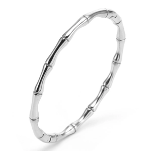 Polished silver stainless steel bamboo style jointed bracelet for women on white background