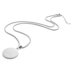 Close-up of silver round pendant with engraved scripture on a polished box chain